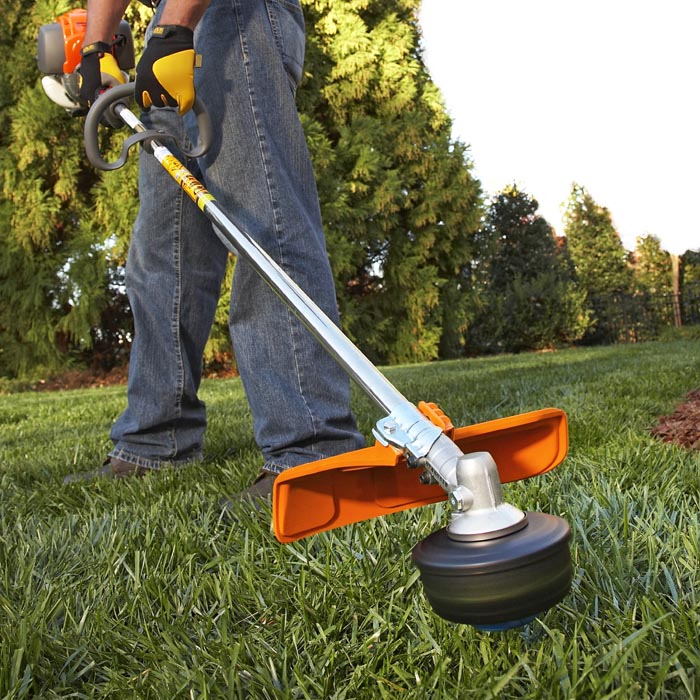 Proper angle of how to use a string trimmer.
