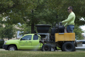 Engledow employee spraying for weeds